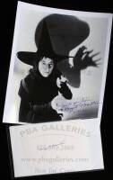 Movie still inscribed and signed by Margaret Hamilton, plus signed sheet of paper