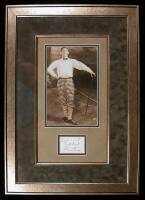 Framed photograph and clipped autograph of Eddie Cantor in a staged golfing scene