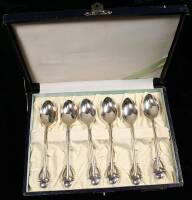 Set of six demitasse silver golf spoons with original display box