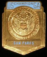 The personal USGA Champion metal badge / pendant of the 1935 U.S. Open Champion, Sam Parks Jr.