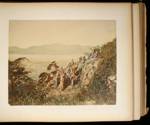 Japanese Photograph Album containing 35 hand-painted albumen photos