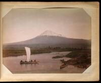 Two Japanese Photograph Albums containing 63 hand-painted albumen photos