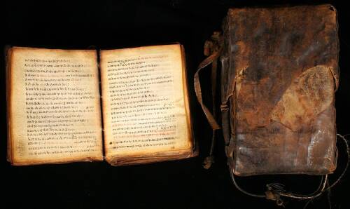 Eighteenth Century Ethiopian Coptic Bible, hand-written in the Ge’ez script, with leather traveling case