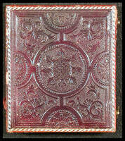 Two portraits of children in an embossed case