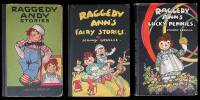 Three volumes of Raggedy Ann and Raggedy Andy stories